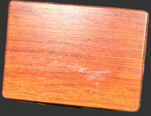 Wooden box on a world map background