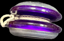 Purple yoyo on a world map background