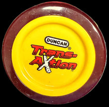 Yellow and red Duncan Trans-Arm yo-yo on a map background