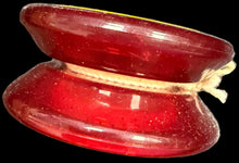 Red glass container with a map of Russia in the background