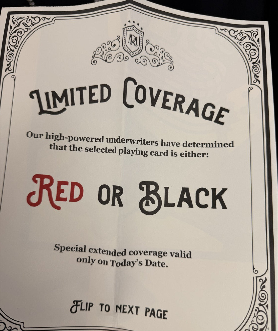 Playing card with 'Limited Coverage' text and 'Red or Black' choice on a black background
