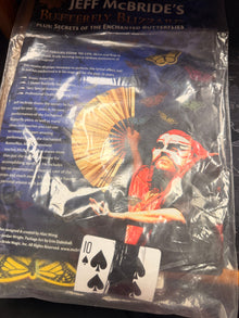 Packaged product with illustrations and text, likely a collectible item or toy.