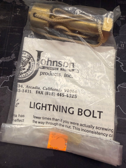 Johnson Precision Munitions Lightning Bolt product packaging on a dark surface