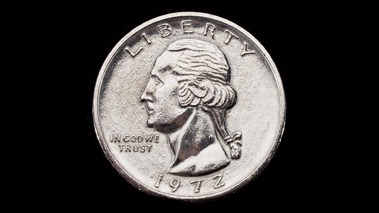 Silver coin with a profile of a person and 'Liberty' text on a black background