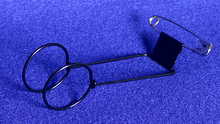 Metal safety pin on a blue background