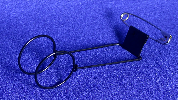 Metal safety pin on a blue background