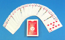 Playing cards fanned out with a red Fox Lake Playing Cards box on a blue background