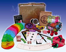 Collection of magic tricks and props with a focus on colorful items and a wooden box.