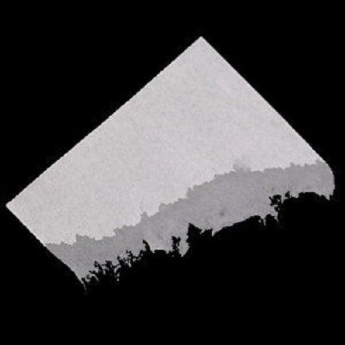 Silhouette of a mountain peak with a diamond-shaped gray area above it on a black background