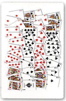 Playing cards scattered on a white background