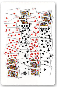 Playing cards scattered on a white background