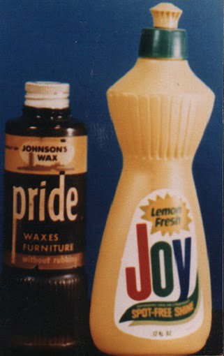 Johnson's Wax Pride wax and a Lemon Fresh Joy dish soap bottle on a blue background
