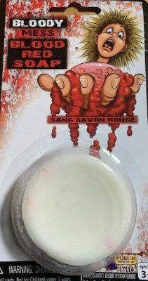 Packaged soap with cartoon character on a wooden surface