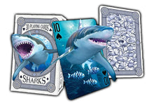 Playing cards with shark design on a white background