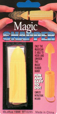 Magic Snapper product packaging with yellow rubber band on a pink background