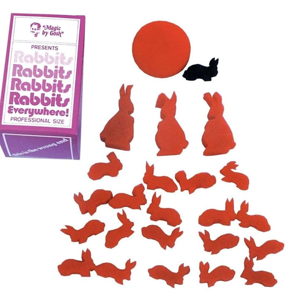 Red rabbit-shaped stickers with a purple book titled 'Rabbits Everywhere!' on a white background.