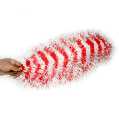 Red and white feather duster held by a hand on a white background