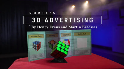 Rubik's Cube-themed 3D advertising display with text overlay on a stage setting.