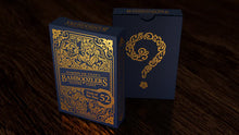 Two blue and gold boxes labeled 'Bamboozlers' on a dark wooden surface