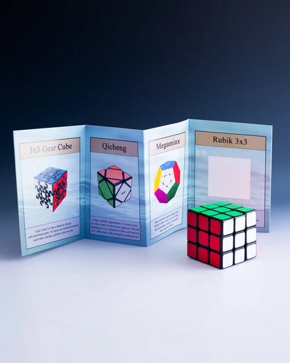 Rubik's Cube and other puzzle cubes with a display card on a dark background