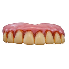 Set of dentures on a white background