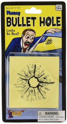Product packaging for a bullet hole decoration with a warning label.