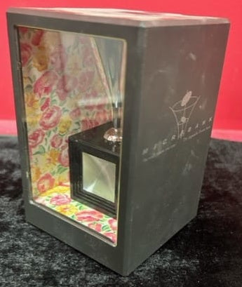 The Incredible Coin-Shrinking Money Box - MagicKits.com Magic Shop