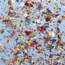 Colorful confetti scattered on a blue background