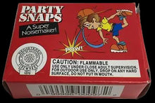 Red box of Party Snaps noisemaker with warning label on a white background