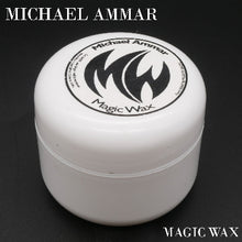 White container of Michael Ammar Magic Wax on a black background