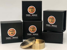 Black boxes with Tango Magic logo and gold containers on a white background