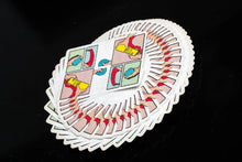 Set of tarot cards fanned out on a black background