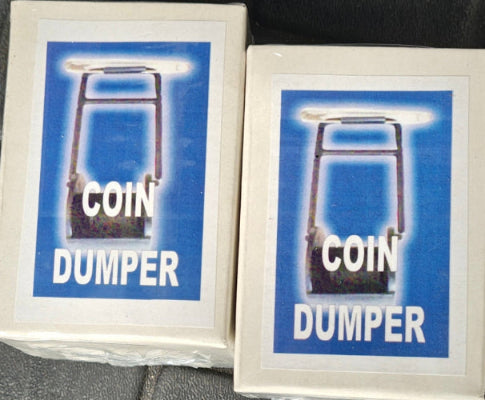 Two boxes labeled 'Coin Dumper' on a dark surface
