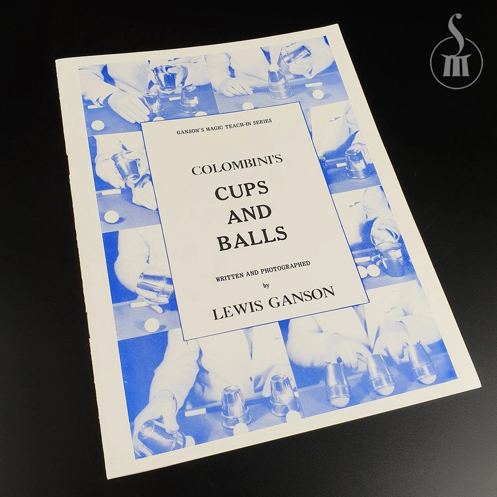 Booklet titled 'Colombini's Cups and Balls' by Lewis Ganson on a dark background