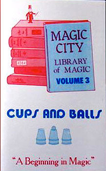 Book titled 'Cups and Balls' from 'Magic City Library of Magic Volume 3' on a white background