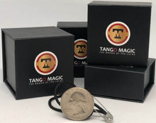 Tango Magic packaging with a coin and necklace on a white background