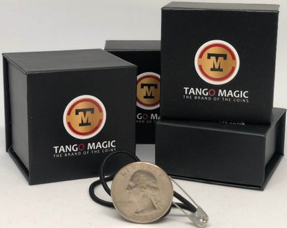 Tango Magic packaging with a coin and necklace on a white background