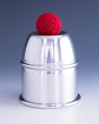 Metallic container with a red ball on top against a gray background
