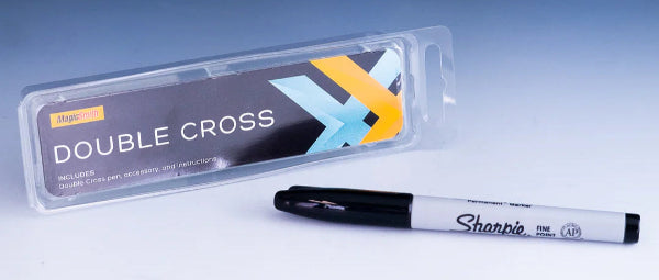 Sharpie marker and Double Cross packaging on a gradient blue and white background