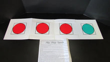 Color recognition activity with red and green circles on a black background