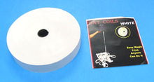 White reel of fishing line with a card labeled 'Hat Coils White' on a blue background