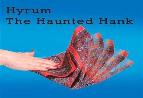 Red and brown patterned fabric with a hand holding it against a blue background, featuring text 'Hyrum The Haunted Hank'.