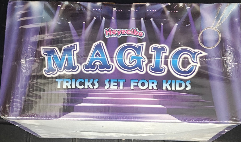 Product packaging for 'MAGIC Tricks Set for Kids' with a purple and white design.