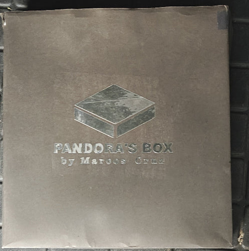 Gray box with 'Pandora's Box by Marcos Cruz' branding on a black background