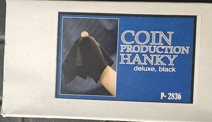 Product packaging for a coin production hanky with a black hanky and coin on a blue background.