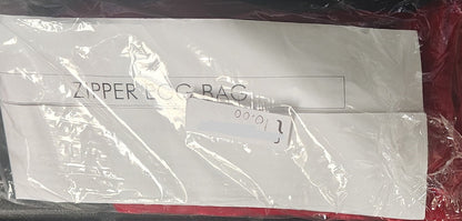 Clear plastic bag with 'Zippers & Co' branding on a red background