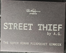 Cardboard box with 'Street Thief' text and branding on a gray background