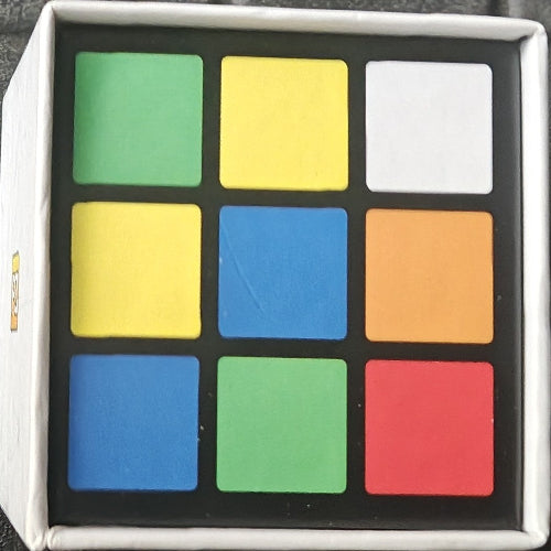 Color swatch palette with nine square samples in various colors.