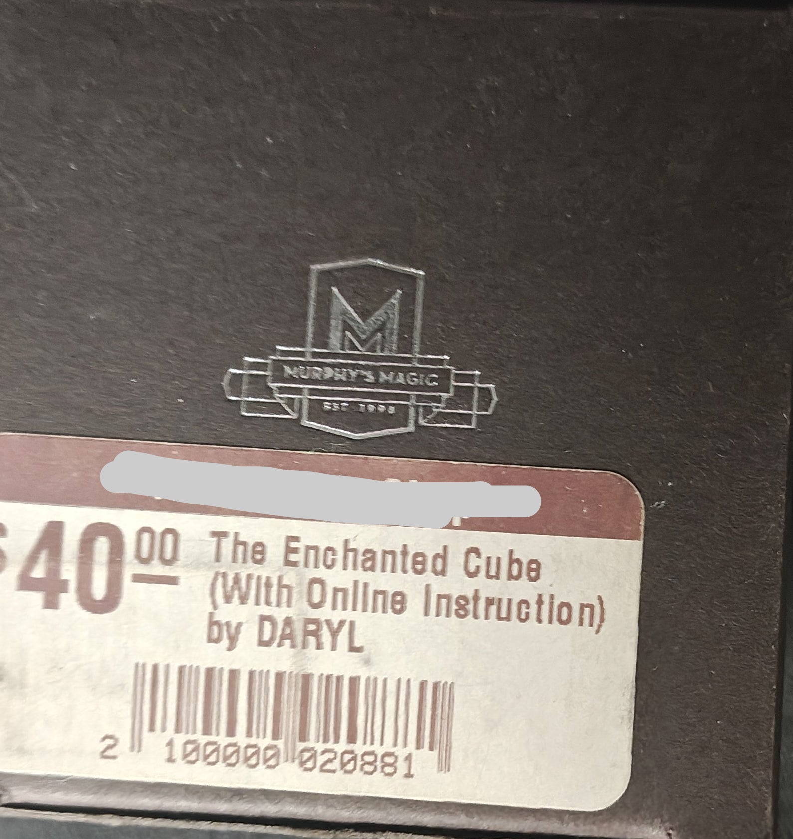 Product packaging Magickits.com magic Shop logo and label on a dark background