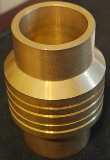 Brass fitting on a wooden surface